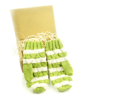 Christmas gift winter green with white mittensの写真素材