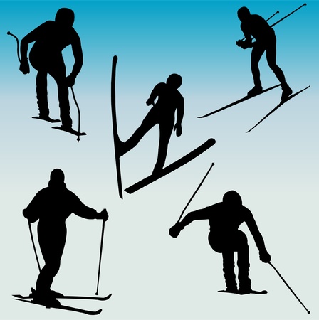silhouettes of skiers のイラスト素材