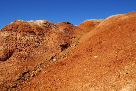 Natural red mountains in spring in Kyzyl-Chin valley, also called as Mars valley. Altai, Siberia,...