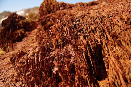 Layered red rock texture in the Altai mountainsの写真素材