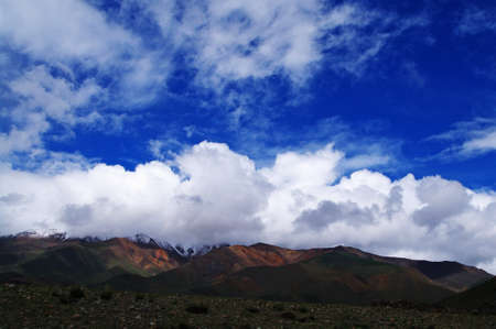 blue sky and white clouds over the vast Mongolian steppesの写真素材