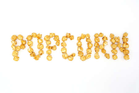 The inscription popcorn is isolated on whiteの写真素材