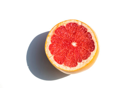 Red orange close-up, isolated on a white background with a shadow.の写真素材