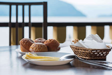 Outdoor terrace with breakfast in the mountains. A table in a restaurant with a view of the...