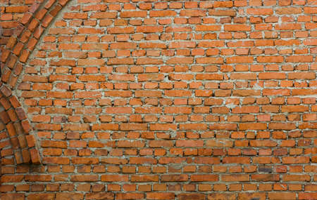 construction of a bell tower and a church. Brick wall. Background texture