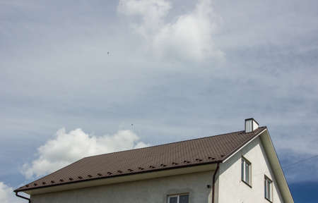 the roof of the house in which modern roofing materials are usedの写真素材