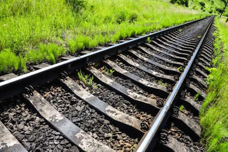 railway tracks on which trains run on a summer day. travel and transportation