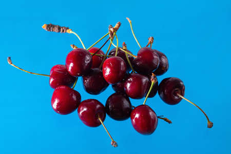 Ripe cherries on a solid background, healthy vegetarian food. Beautifulの写真素材