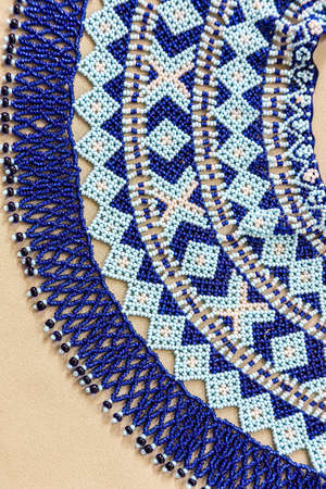 traditional clothes and beaded jewelry. traditional ornaments and patterns. handmade.