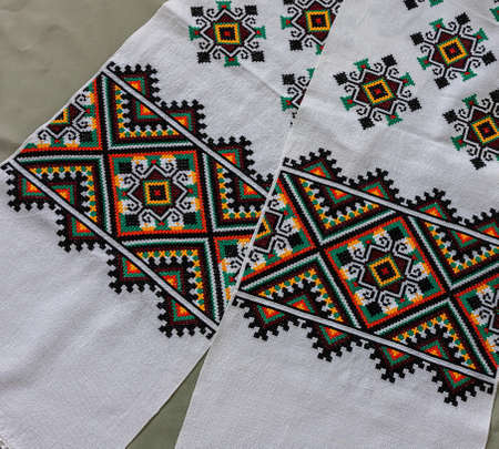cross-stitch products folk crafts ornaments and patterns embroidered on canvas. linen cloth