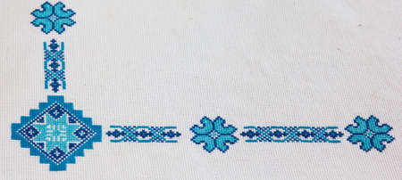 cross-stitch products folk crafts ornaments and patterns embroidered on canvas. linen cloth