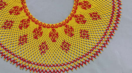 traditional clothes and beaded jewelry. traditional ornaments and patterns. handmade.