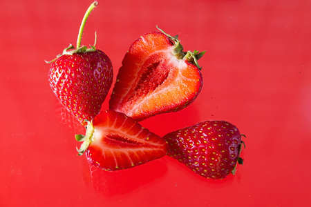 Ripe strawberries on a solid background, healthy vegetarian food. Beautifulの写真素材