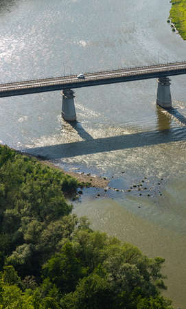 road bridge over the river top view water sky