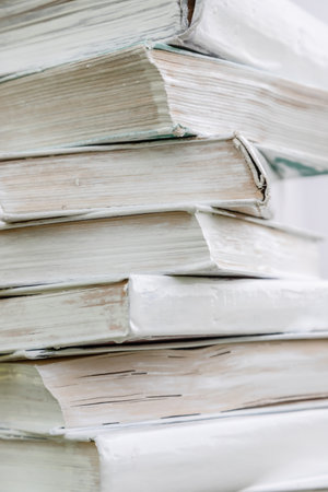 stack of stacked blank books on white background