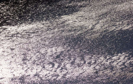 Fast river water background with waves and ripple pattern.の写真素材