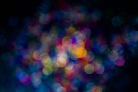 glittering shine bulbs lights background. abstract blurred of blue and silver glittering shine bulbs lights background. Christmas Tree Lights and Decoration Bokeh Blurred Out of Focus Background.の写真素材