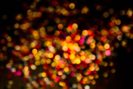 glittering shine bulbs lights background. abstract blurred of blue and silver glittering shine bulbs lights background. Christmas Tree Lights and Decoration Bokeh Blurred Out of Focus Background.の写真素材