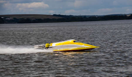 sport. motor boat races. speed, water sports. competition on the water on a sunny day.の写真素材