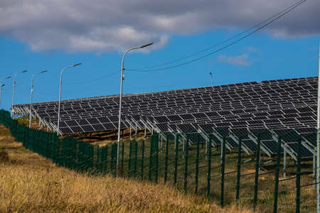 Solar panels in Large Photovoltaic power station, solar park, Renewable energy Sustainable energy,...