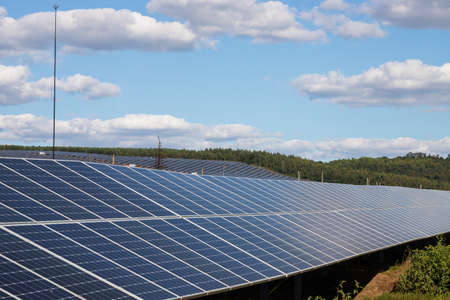 solar panels with the sunny sky. Blue solar panels. background of photovoltaic modules for renewable...