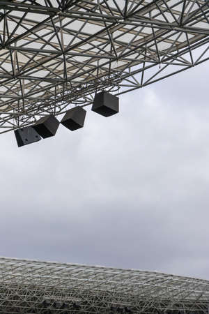 lights and speakers of sport stadium, Soccer football stadium roof.の写真素材