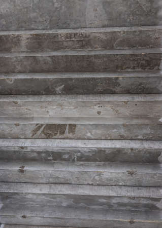 Gray concrete staircase in modern contemporary minimalistic interior.