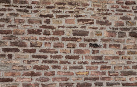 Stone wall texture background natural color. Closeup.