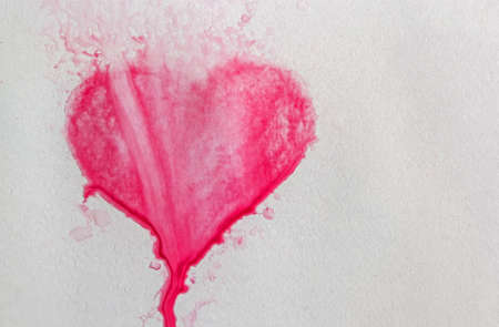 Watercolor hand painted red heart, paper texture.の写真素材