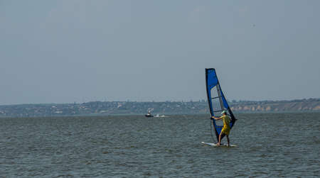 windsurfing. Entertainment at sea, extreme sports, lifestyle during the summer holidays.の写真素材
