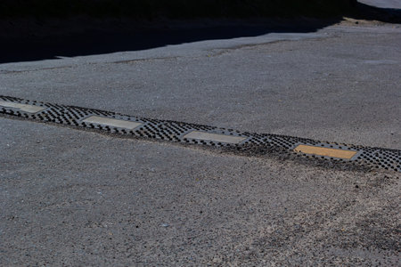 Lying police installations to regulate the speed of cars in the city.の写真素材