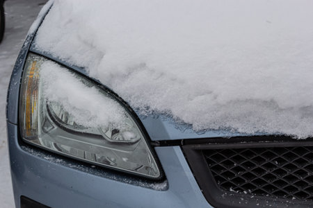 Cars Covered With A Snow In A Row After Snowfall Detailed Stock Photo.の写真素材
