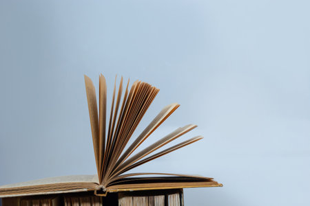 open book on pile of books background shcool study book. The concept of reading literature, education and book publishing. Free space for text.の写真素材
