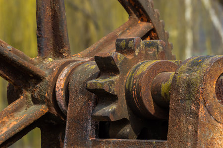Separate metal elements of the gateways of the ancient dam of the mill.の写真素材