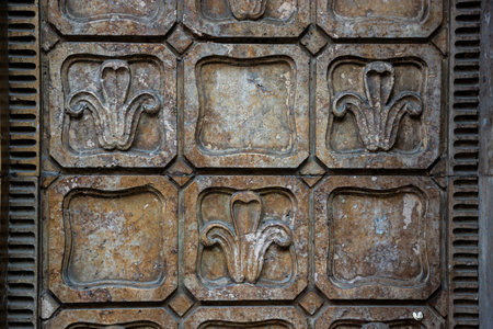 Beautifully detailed wall panels feature floral motifs created from stone, found in a historical...