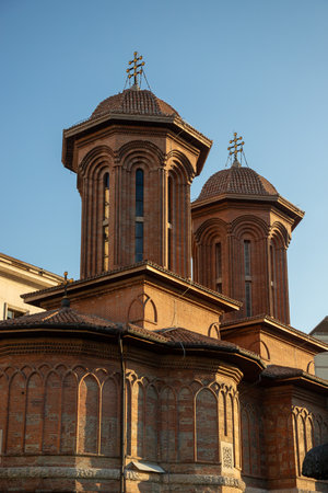 Bucharest features stunning old church architecture with two unique towers, beautifully illuminated...