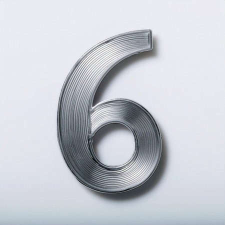 A sleek gray metal number six features intricate spiral designs, standing out against a simple background, showing modern craftsmanship.の素材