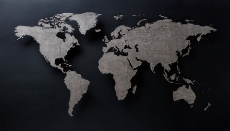 A world map design displays black borders on a dark background, showing a peeling paint texture that enhances its artistic feel.の素材