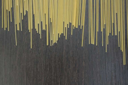 pasta on darck wooden boardの写真素材