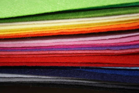 Fan of colored bright felt textile materialの写真素材