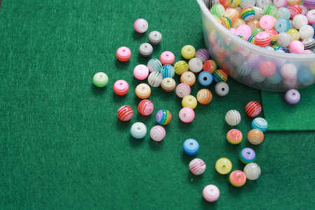 beads on the green felt table