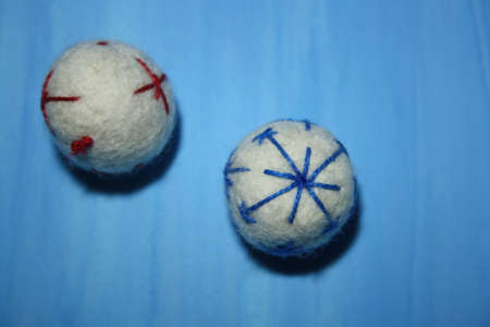 felt beads on the blue backgroundの写真素材