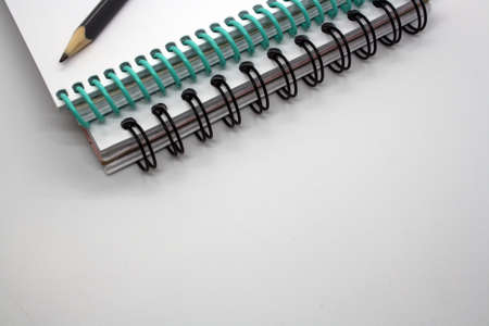 Notepad for notes and sketches on a white background. Space for text.の写真素材