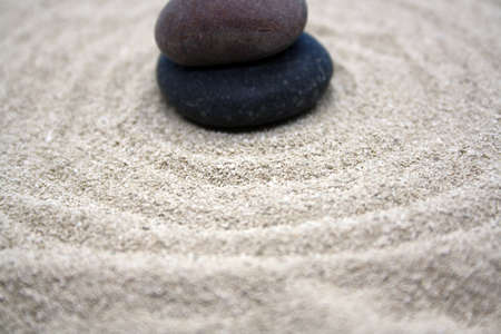 Sea round stones on the fine sand. Selective focus. Space for text.の写真素材