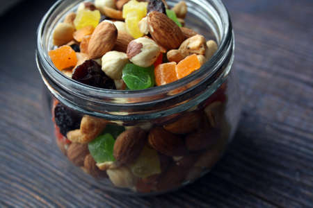A mixture of nuts, dried fruits and candied fruits. Space for text.の写真素材