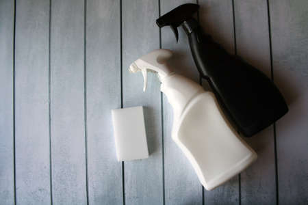 Spray for cleaning on a wooden surface.