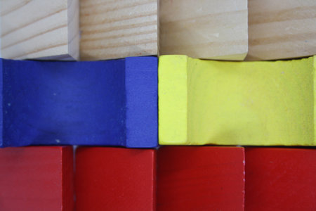 Wooden children's cubes on a white background. Space for text.の写真素材