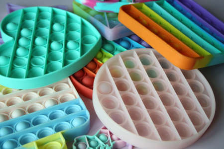 A colorful sensory toy fidget pushes it. Set of children's silicone toys antistressの写真素材