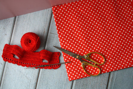 Crochet dress for a doll made of cotton yarn . Home needlework made of thread.の写真素材