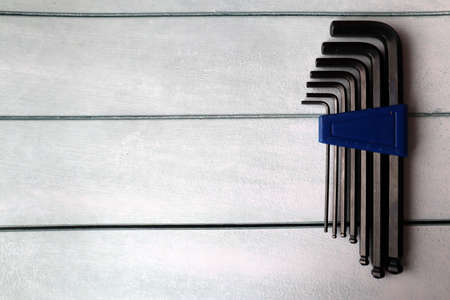 A set of tools on a gray wooden background. top view. Space for text.の写真素材